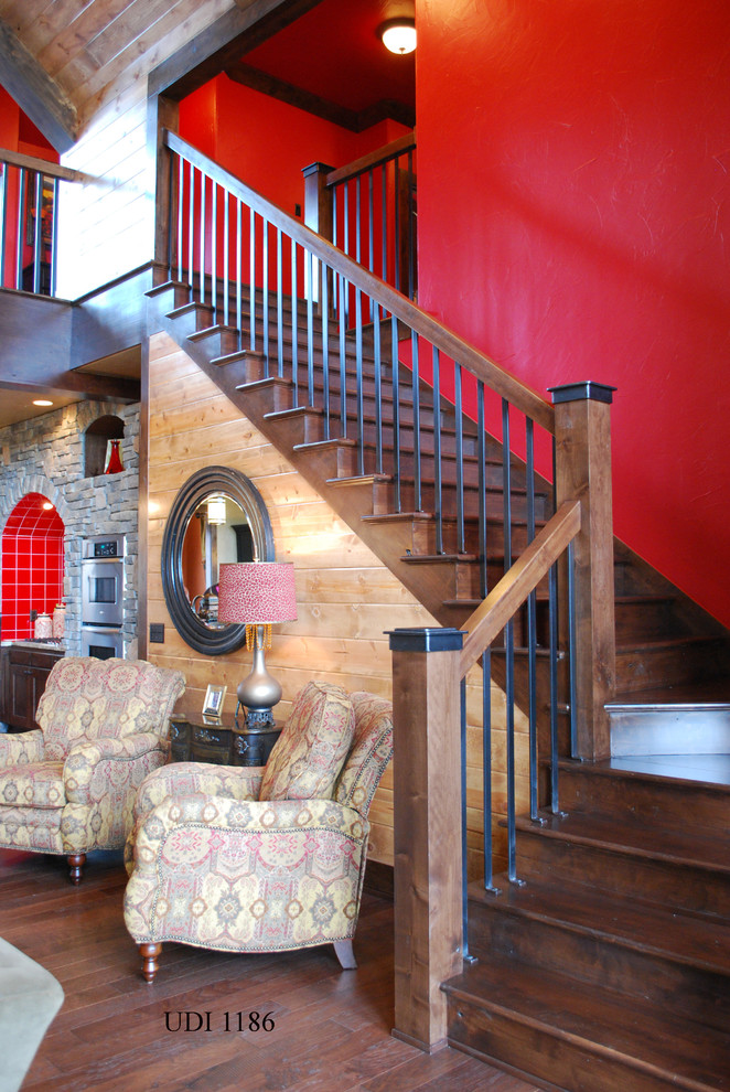 Inspiration for a bohemian staircase in Little Rock with feature lighting.