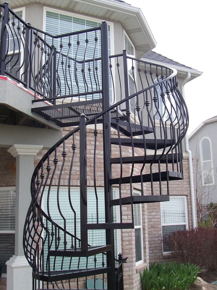Mid-sized minimalist metal spiral open staircase photo in Salt Lake City