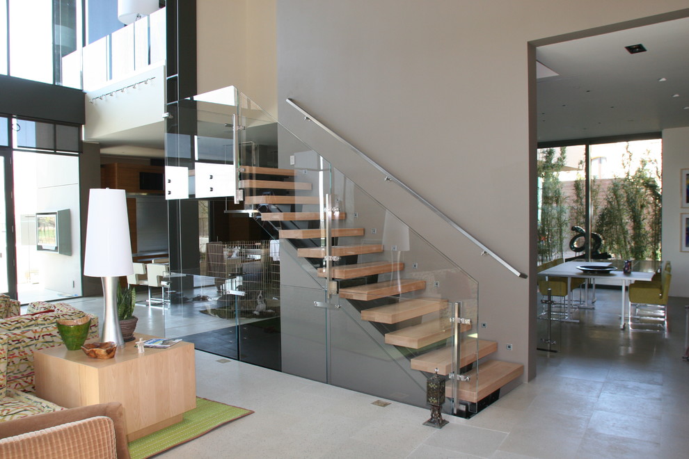 Пример оригинального дизайна: лестница на больцах в современном стиле с деревянными ступенями без подступенок