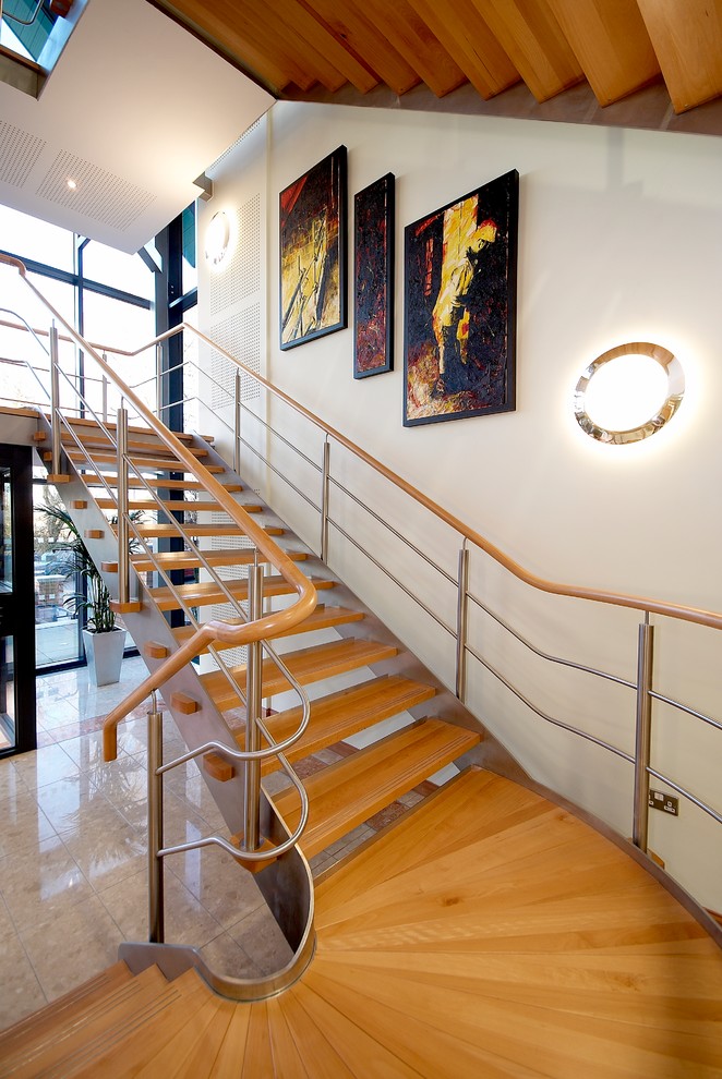 Inspiration for an expansive contemporary staircase in Cambridgeshire.