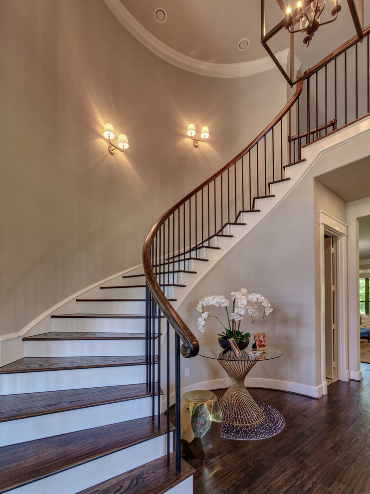 Photo of a medium sized shabby-chic style wood curved wood railing staircase in Dallas with wood risers.