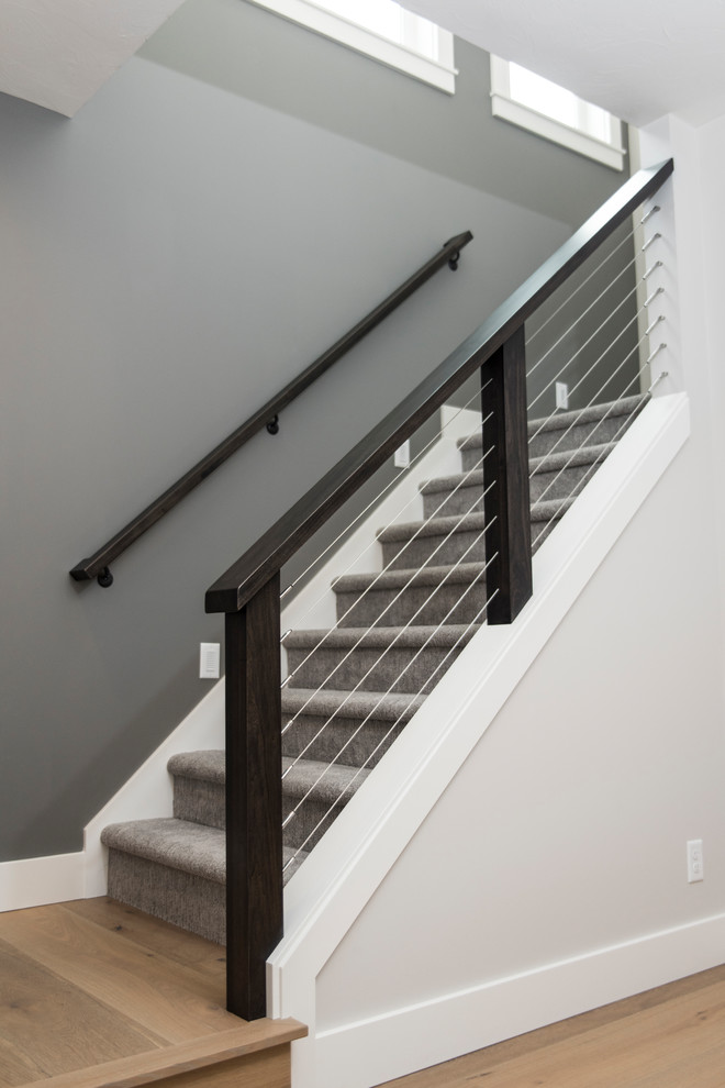 Example of a mountain style staircase design in Grand Rapids