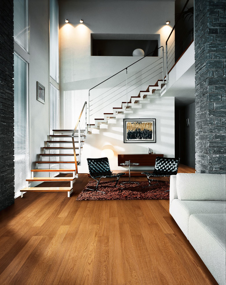 Medium sized industrial wood l-shaped staircase in Chicago with open risers.