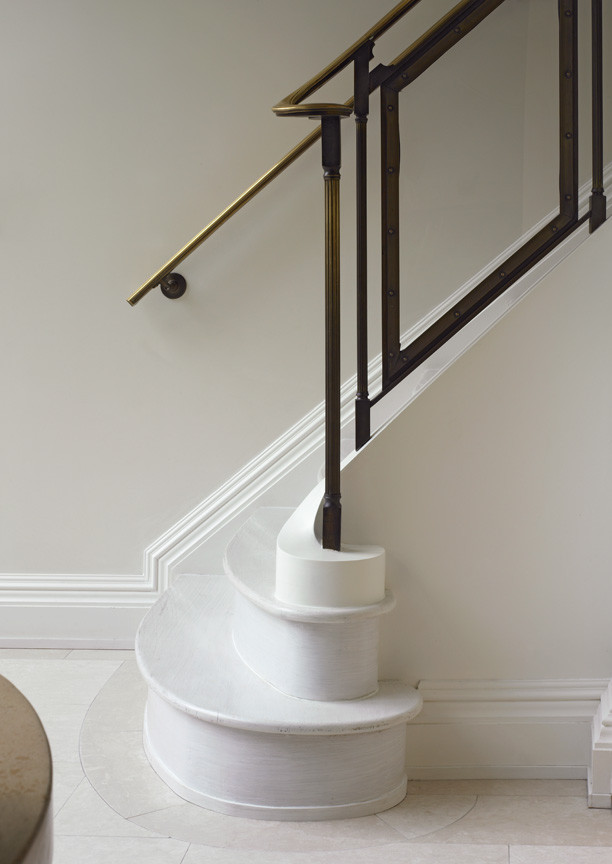 Inspiration for an eclectic painted straight staircase remodel in New York with painted risers