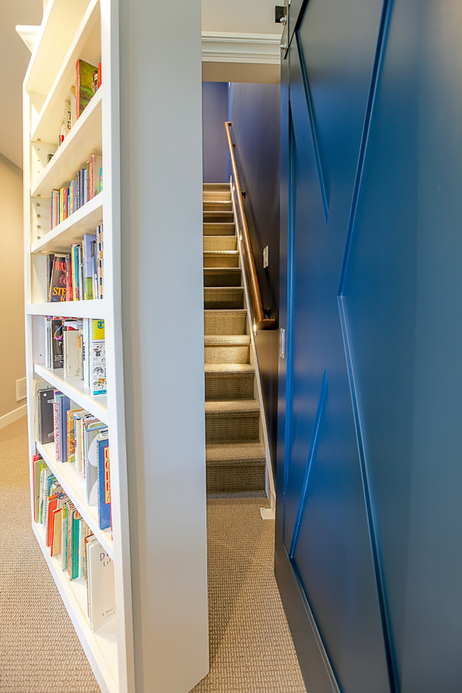 Staircase - farmhouse carpeted straight staircase idea in Grand Rapids with carpeted risers