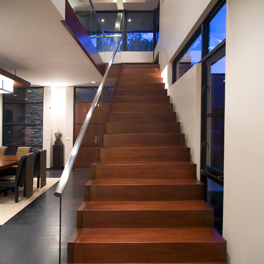 Example of a trendy staircase design in Detroit