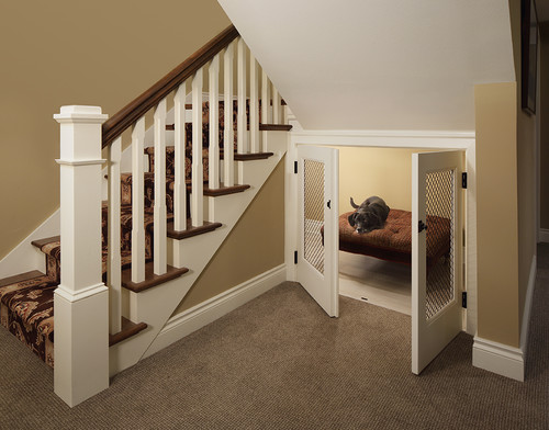 understairs space for a dog bed with vented doors. 