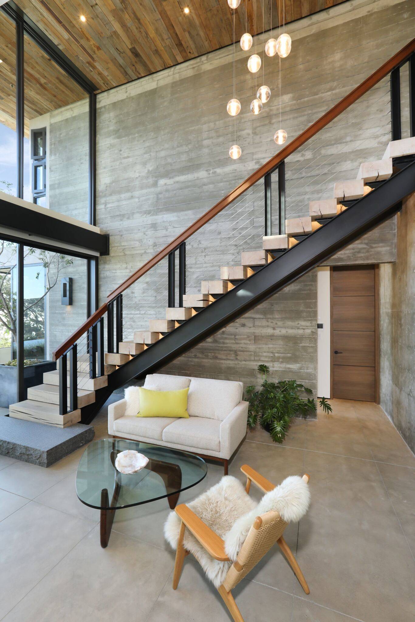 High Ceiling Living Room With Staircase Shelly Lighting 