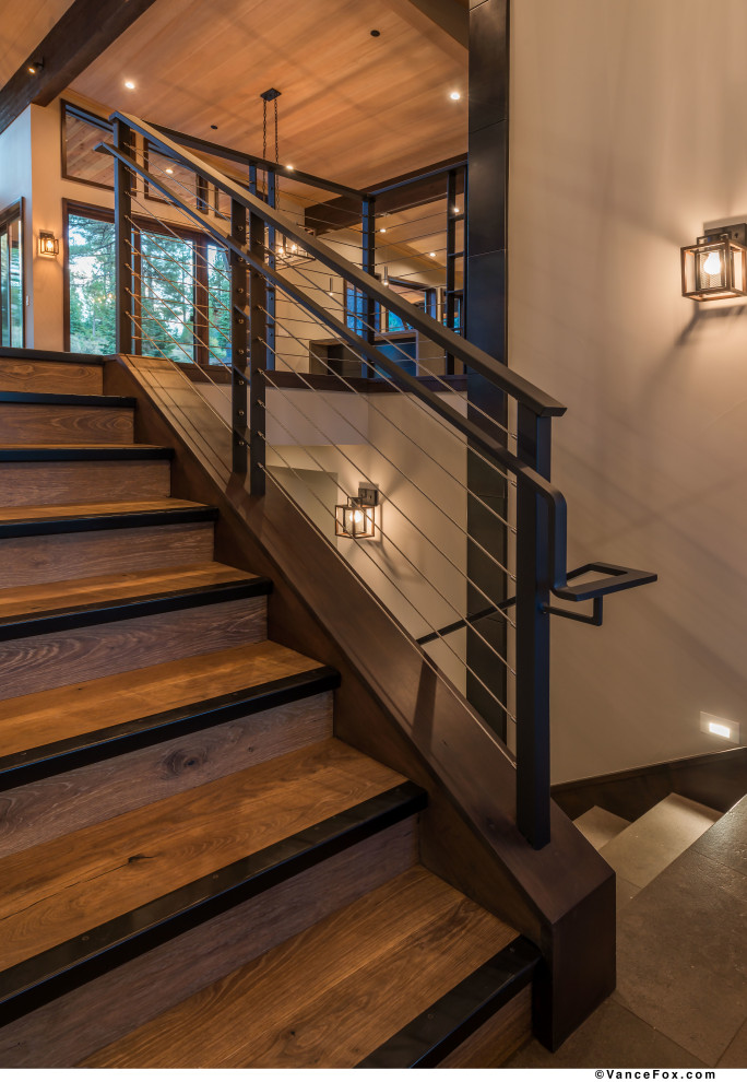 Rustic wood metal railing staircase in Sacramento with metal risers.
