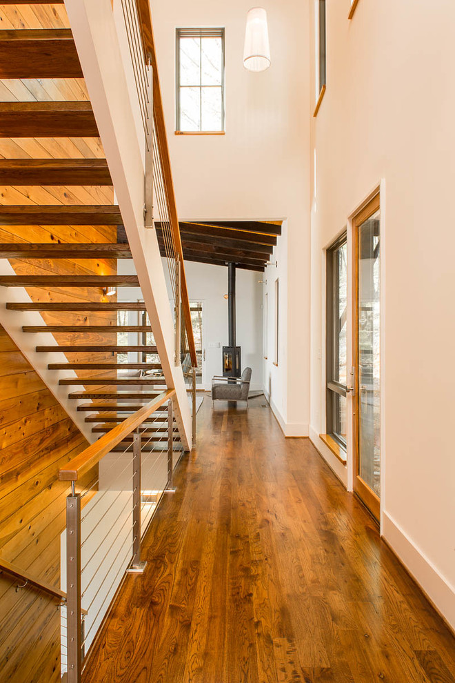 Staircase - mid-sized transitional wooden straight open staircase idea in Atlanta