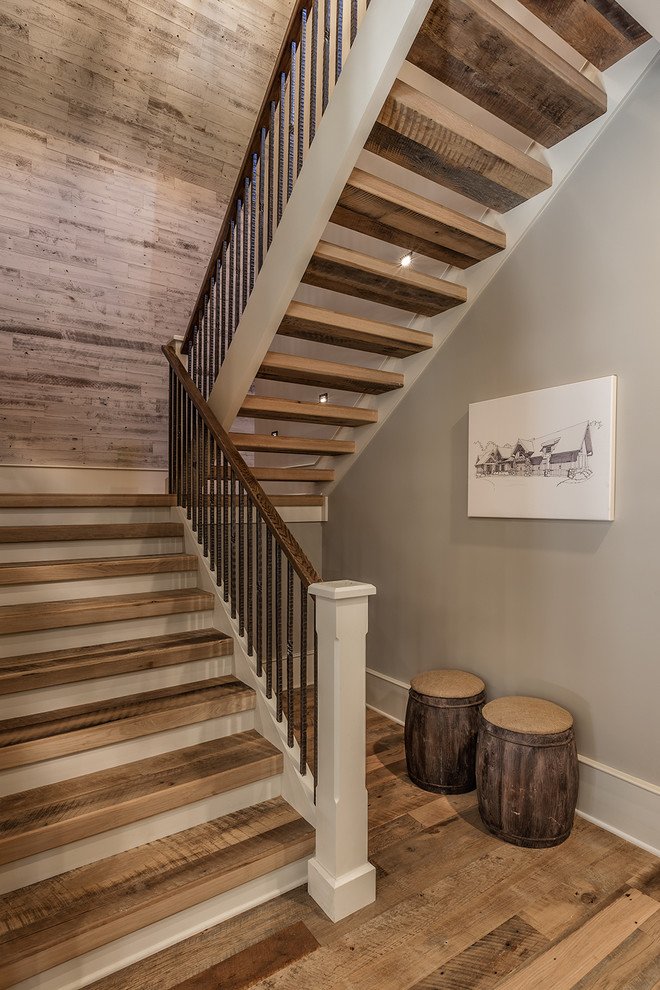 Idées déco pour un escalier sans contremarche craftsman en U de taille moyenne avec des marches en bois.