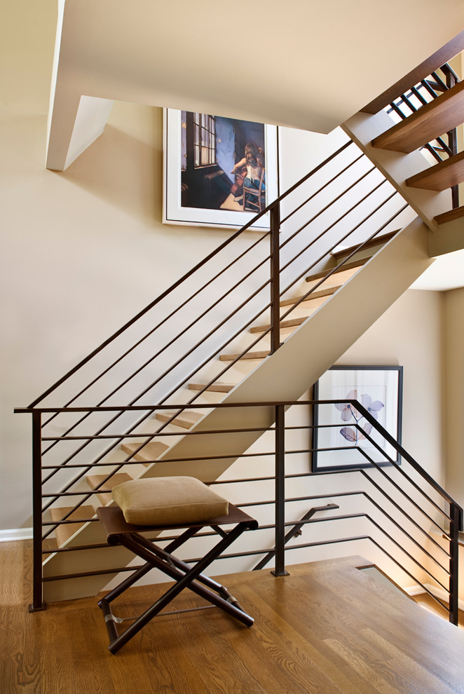 Imagen de escalera en U actual sin contrahuella con escalones de madera