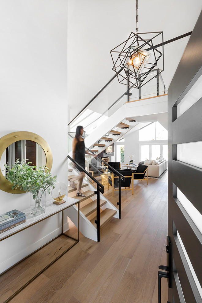 Идея дизайна: изогнутая лестница среднего размера в стиле ретро