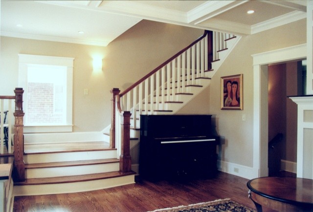 Inspiration for a medium sized traditional wood l-shaped staircase in Atlanta with painted wood risers.
