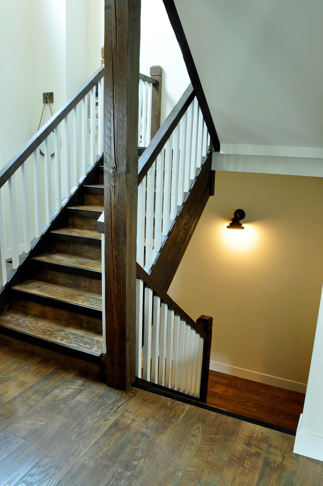 Inspiration for a rustic staircase remodel in Other