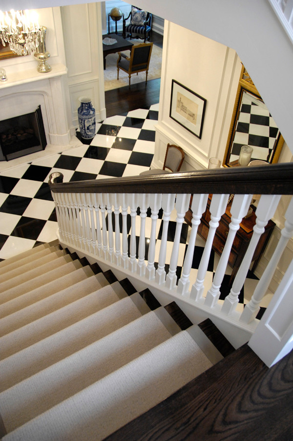 Inspiration pour un grand escalier peint droit traditionnel avec des marches en bois.
