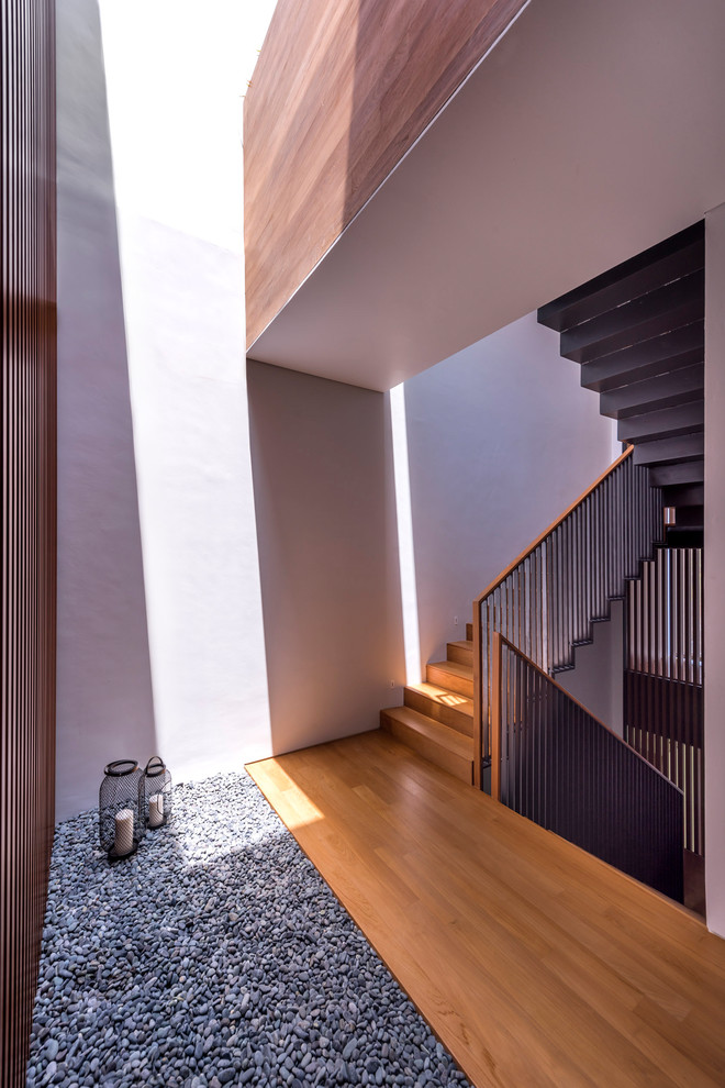 Inspiration for a contemporary staircase remodel in Singapore