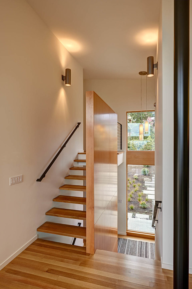 Inspiration for a contemporary floating open staircase remodel in Seattle