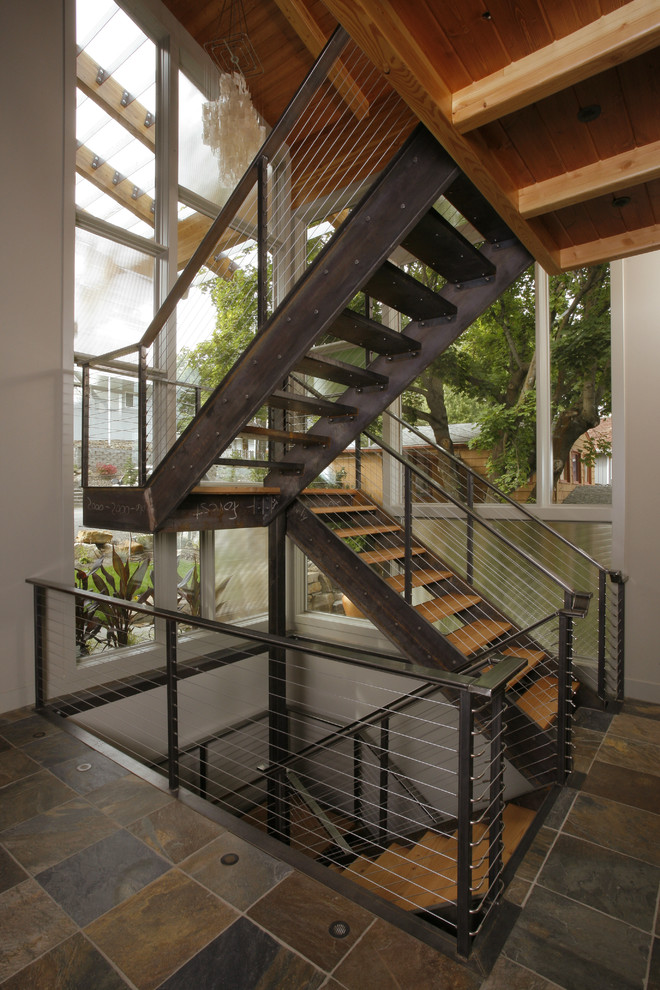 This is an example of a rustic floating staircase in Seattle.