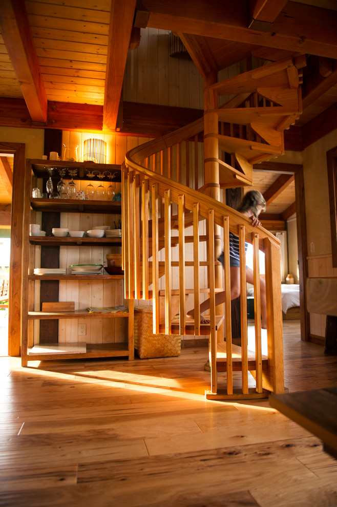 This is an example of a world-inspired wood spiral staircase in Hawaii.