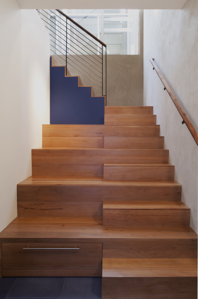 Staircase - modern wooden staircase idea in San Francisco with wooden risers