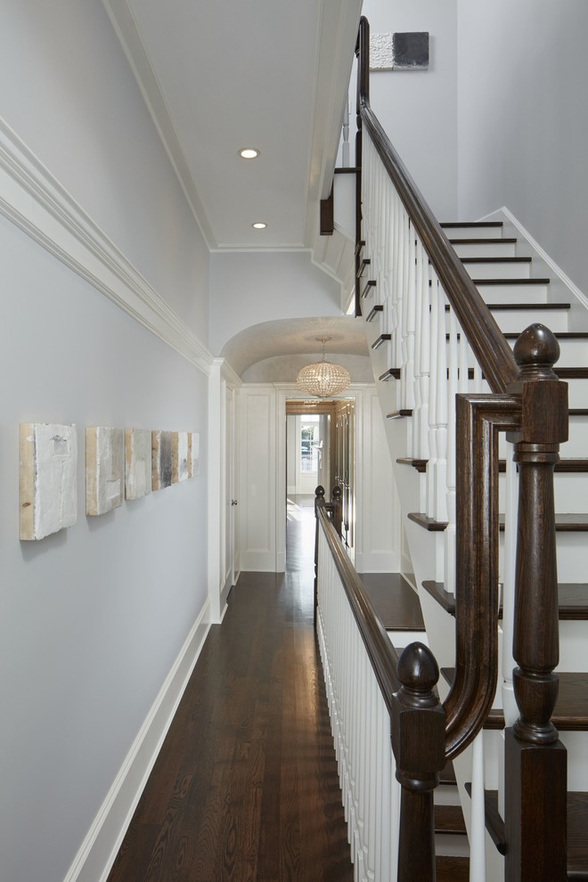 Staircase - large transitional wooden straight staircase idea in Chicago with painted risers