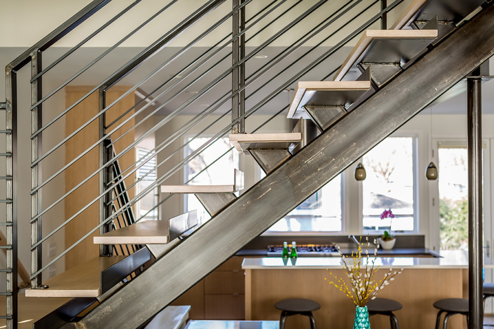 Inspiration for a modern wooden l-shaped open staircase remodel in Minneapolis
