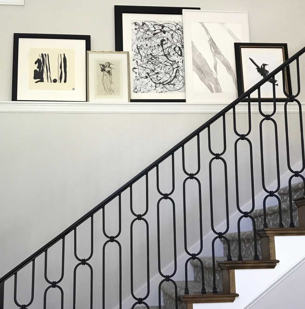 Staircase - large transitional carpeted straight metal railing staircase idea in Salt Lake City with carpeted risers