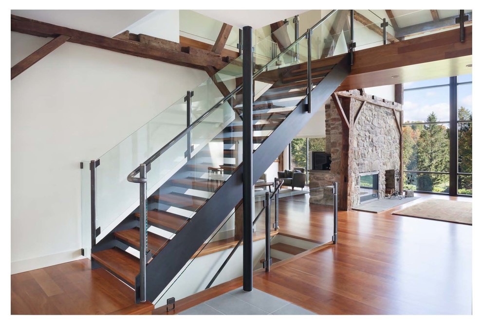 Diseño de escalera contemporánea grande sin contrahuella con escalones de madera