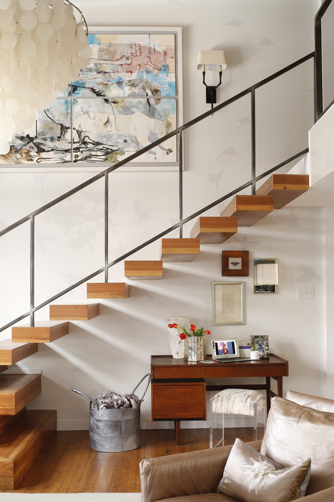 Example of an eclectic staircase design in Raleigh
