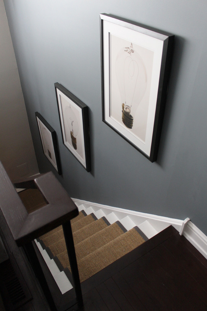 Inspiration pour un escalier peint design en L avec des marches en bois peint.