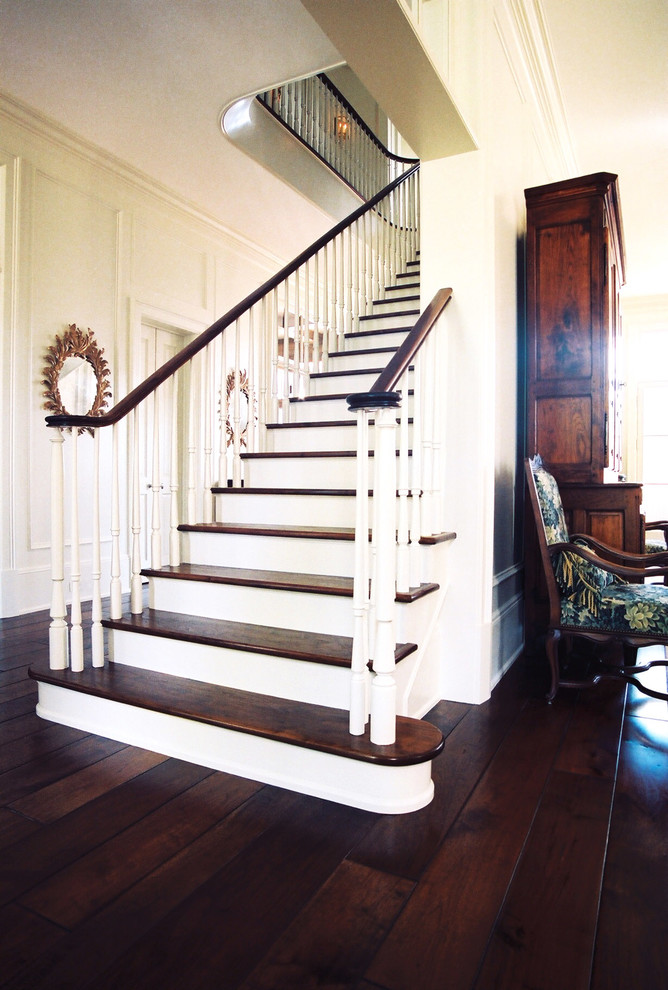 Inspiration for a large timeless wooden straight wood railing staircase remodel in Miami with painted risers