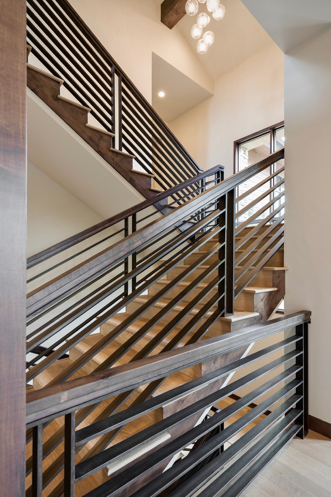 Staircase - large contemporary wooden straight metal railing staircase idea in Salt Lake City with wooden risers