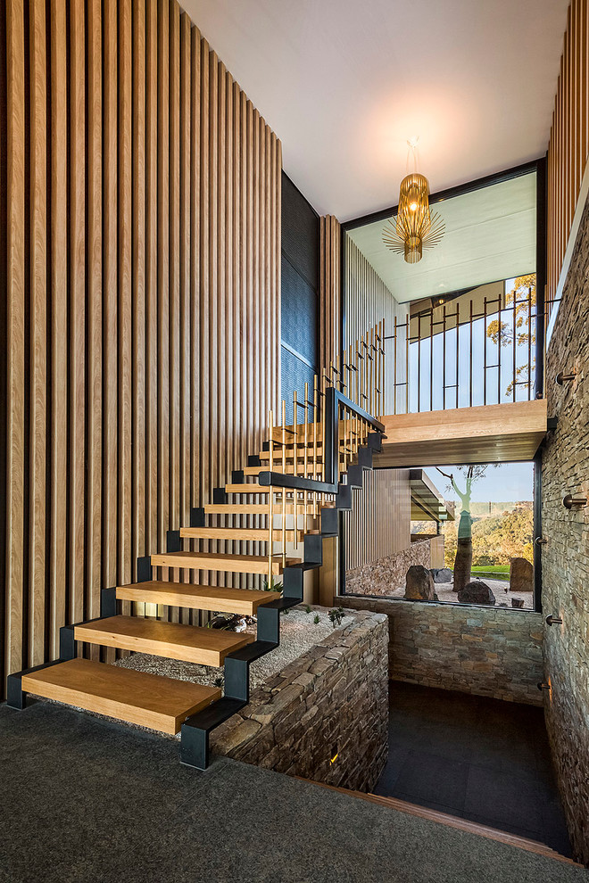 Стильный дизайн: п-образная лестница в стиле ретро с деревянными ступенями без подступенок - последний тренд