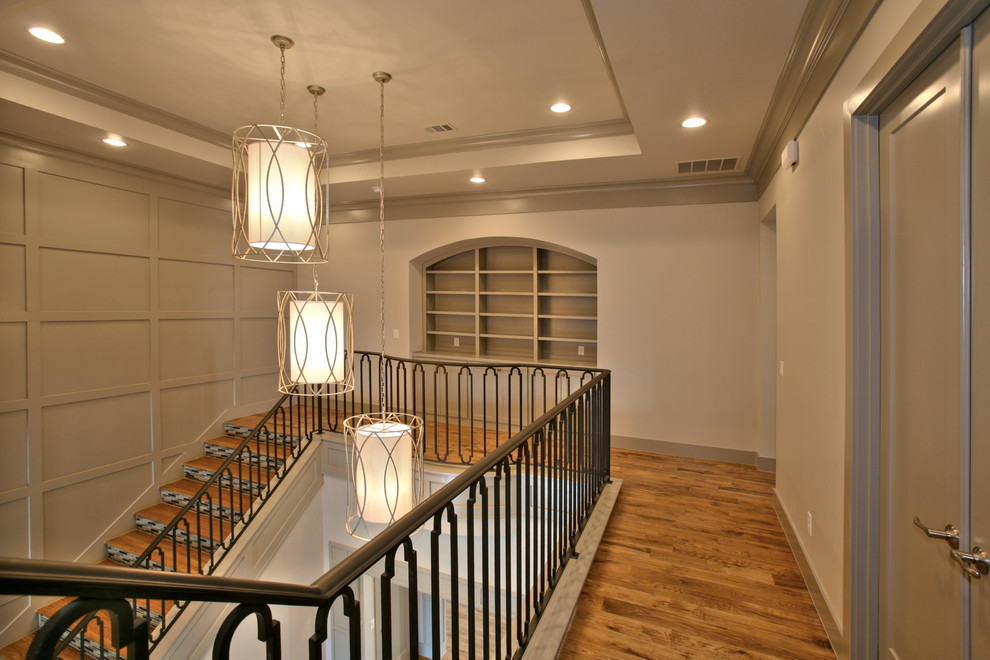 Staircase - mid-sized transitional wooden straight staircase idea in Dallas with tile risers