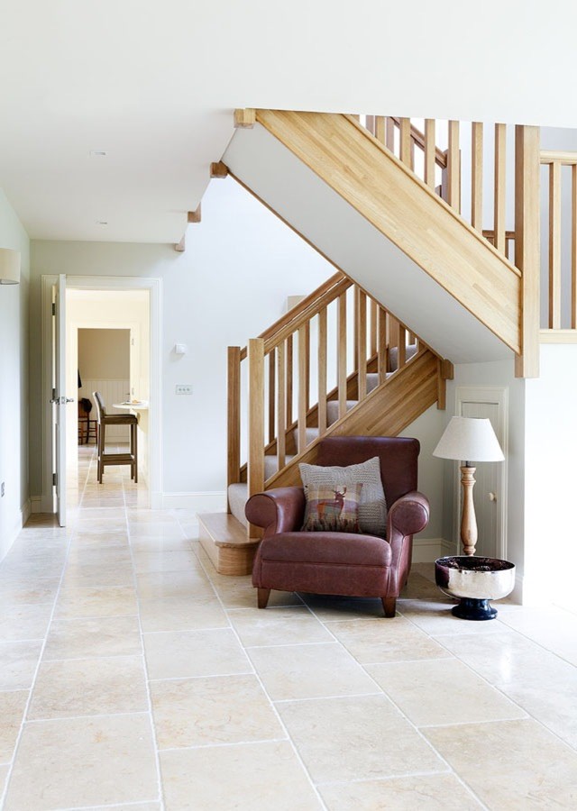 Photo of a classic staircase in Other with feature lighting.