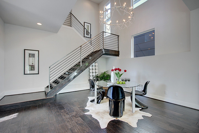 Medium sized contemporary metal floating staircase in Seattle with open risers.