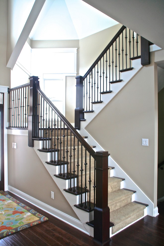 Mid-sized elegant wooden l-shaped staircase photo in Detroit with wooden risers