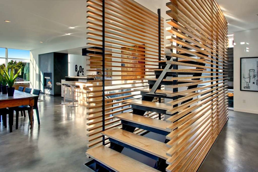 Photo of a contemporary straight staircase in Seattle.