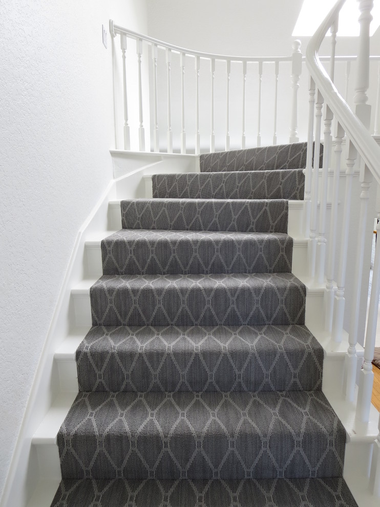 Example of a mid-sized classic carpeted l-shaped staircase design in Los Angeles with carpeted risers