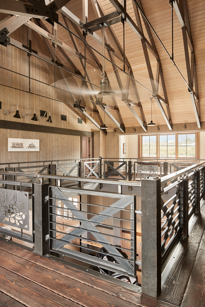 Mittelgroße Landhaus Metalltreppe in U-Form mit Metall-Setzstufen und Stahlgeländer in Seattle