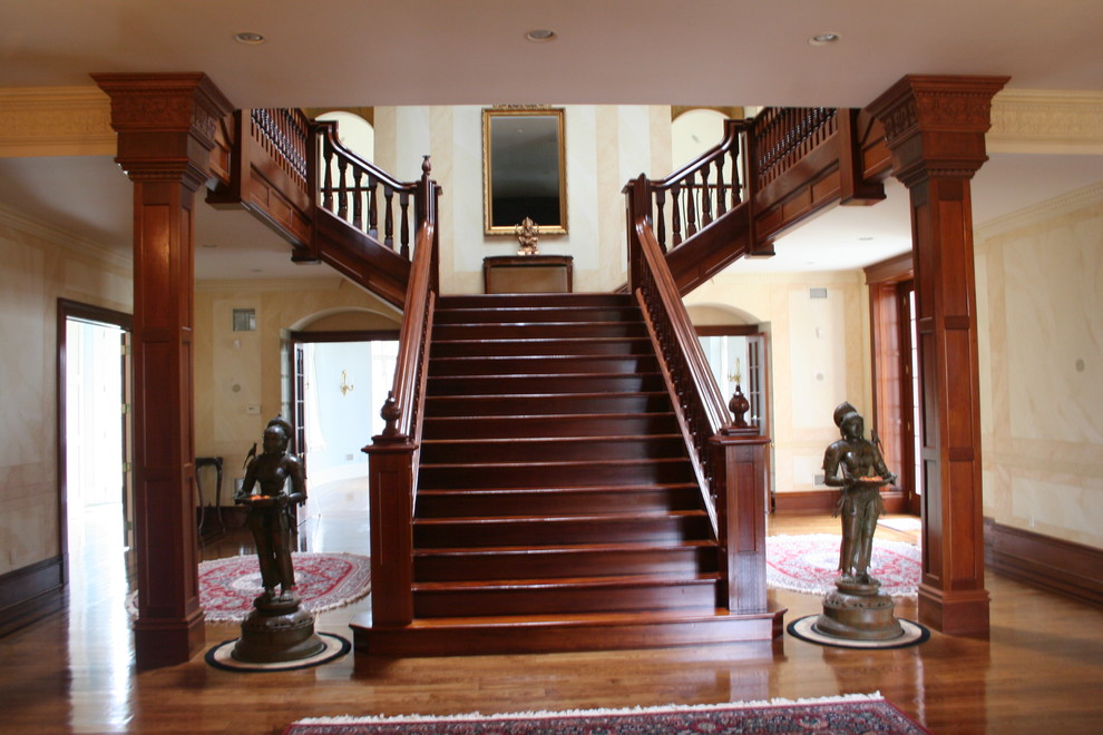 Staircase - large traditional wooden l-shaped staircase idea in New York with wooden risers
