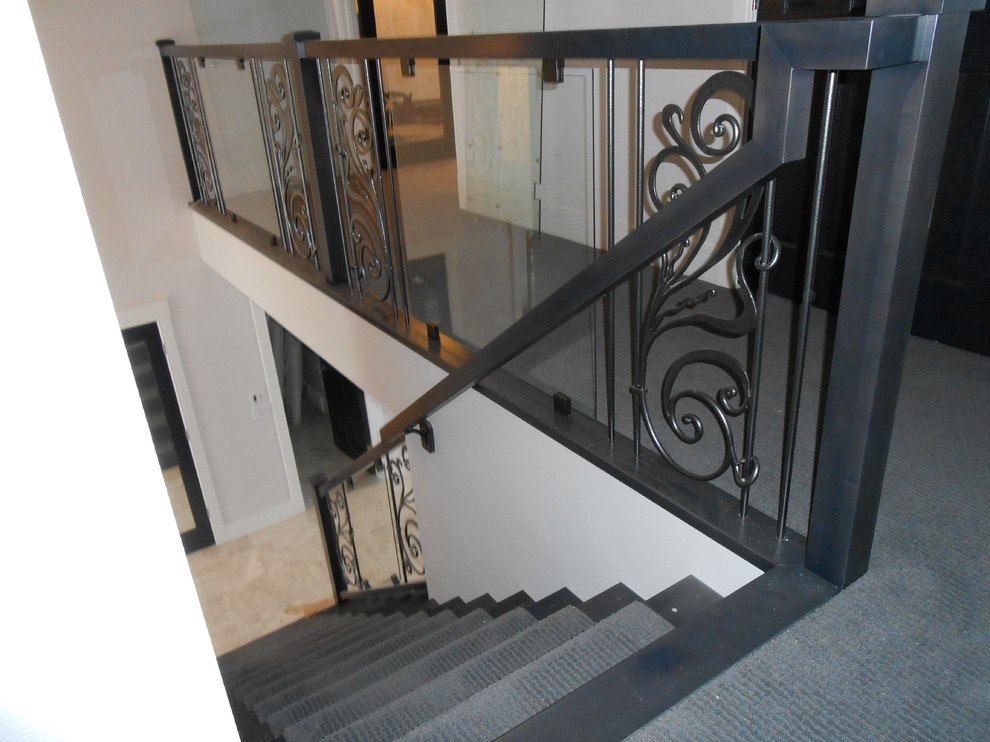 Mid-sized transitional carpeted straight metal railing staircase photo in Other with carpeted risers