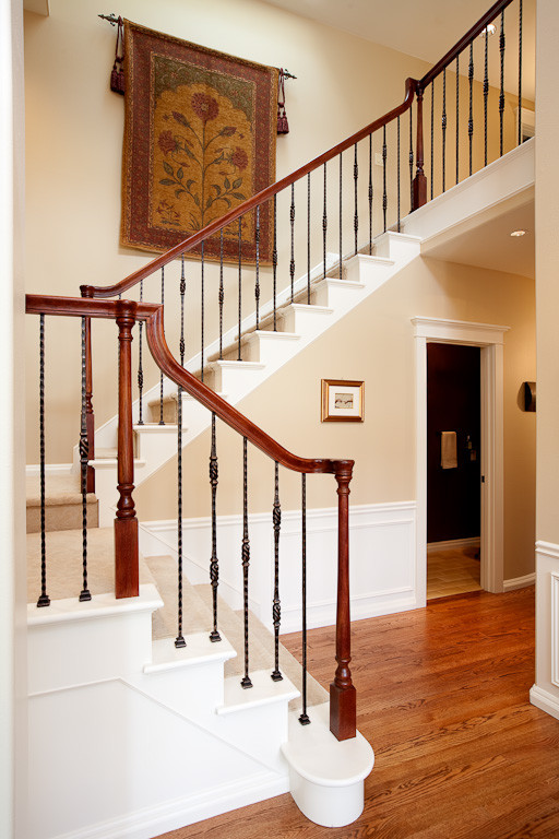 Design ideas for a mediterranean carpeted u-shaped staircase in Seattle with carpeted risers.