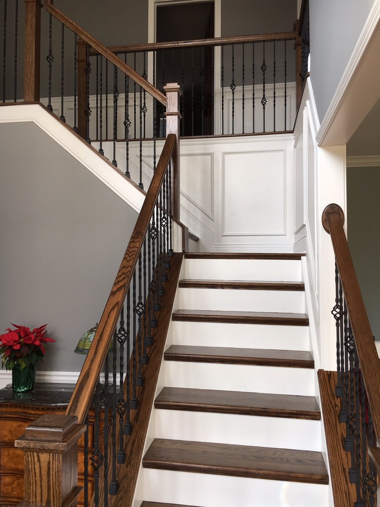 Staircase - large traditional wooden l-shaped wood railing staircase idea in San Diego with painted risers