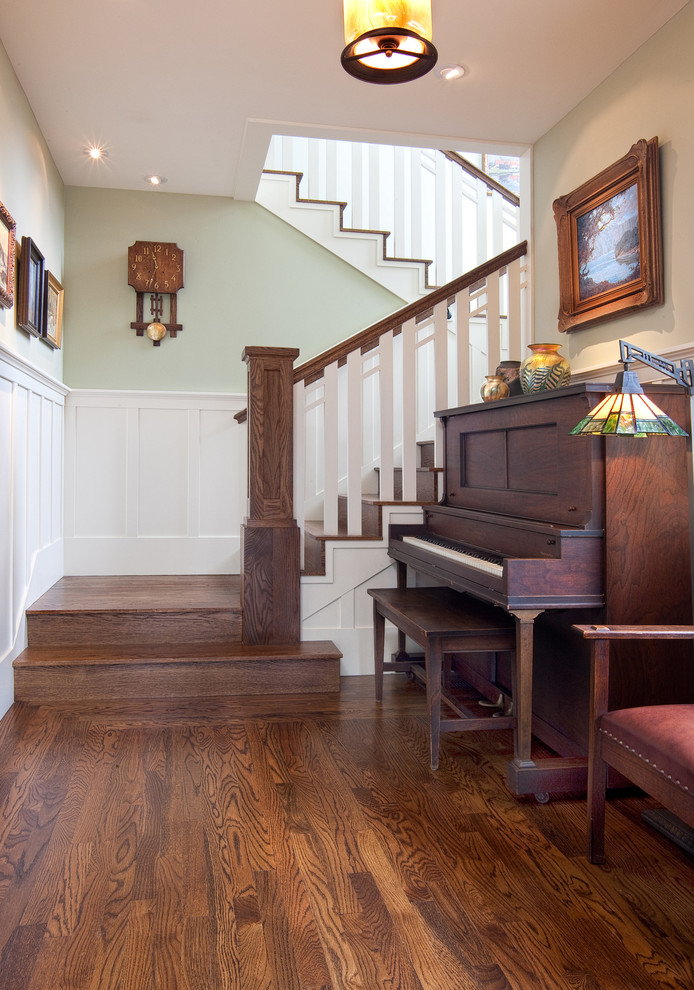 Inspiration for a mid-sized craftsman wooden curved wood railing staircase remodel in San Diego with wooden risers