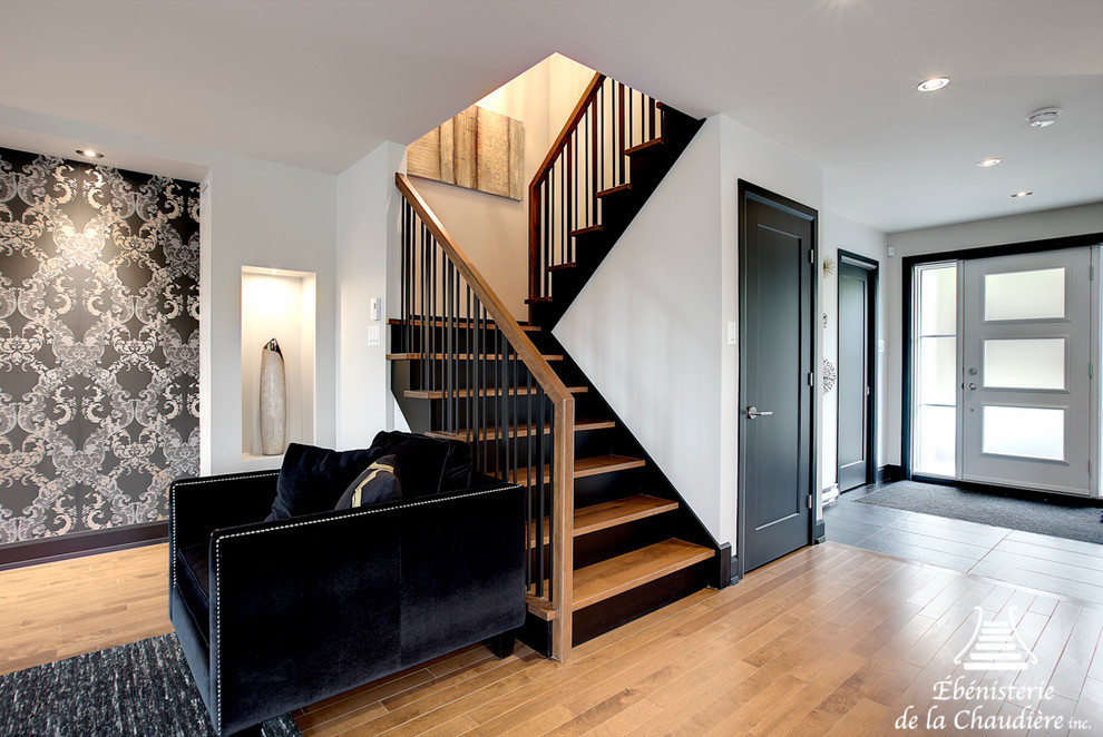 Example of a small trendy wooden u-shaped staircase design in Other with wooden risers