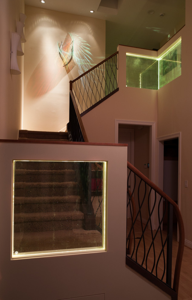 Example of a large transitional carpeted u-shaped staircase design in San Francisco with carpeted risers
