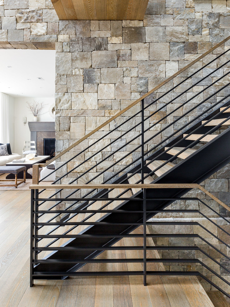 Diseño de escalera en U contemporánea extra grande sin contrahuella con escalones de madera y barandilla de varios materiales