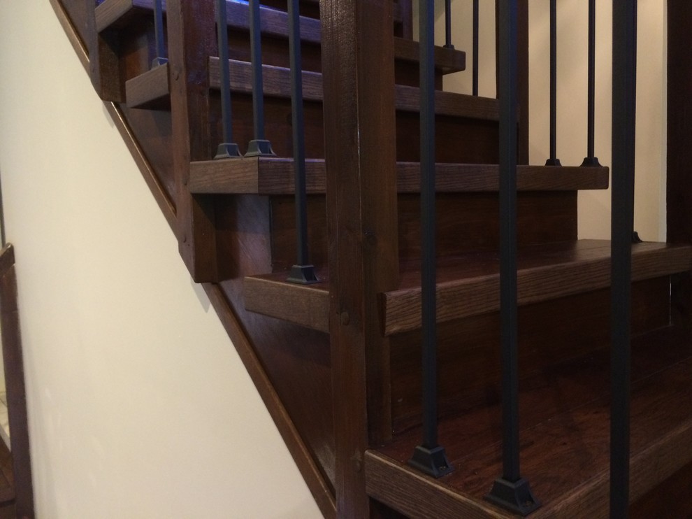 Example of a mid-sized 1960s wooden l-shaped staircase design in Toronto with wooden risers